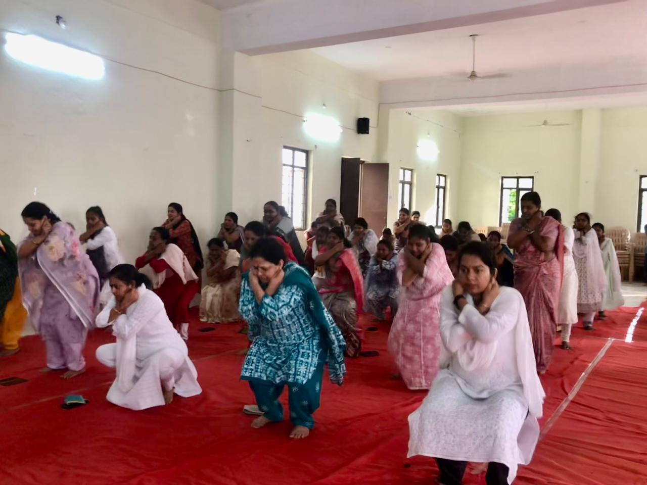Principal Judge Smt. Bharatha Laxmi garu, other Judges, Advocates and Court Staff performing 07 rounds of Super Brain Yoga during Workshop  at Nizamabad Dist. Court Complex-Conference Hall on the eve of International Yoga Day i.e., on 21-06-2025.