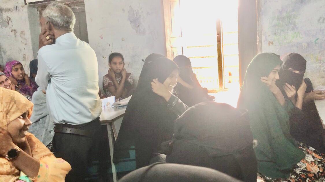 Positioning of fingers on earlobes- Workshop on Super Brain Yoga at Govt. High School, Bheemgal, Dist: Nizamabad.