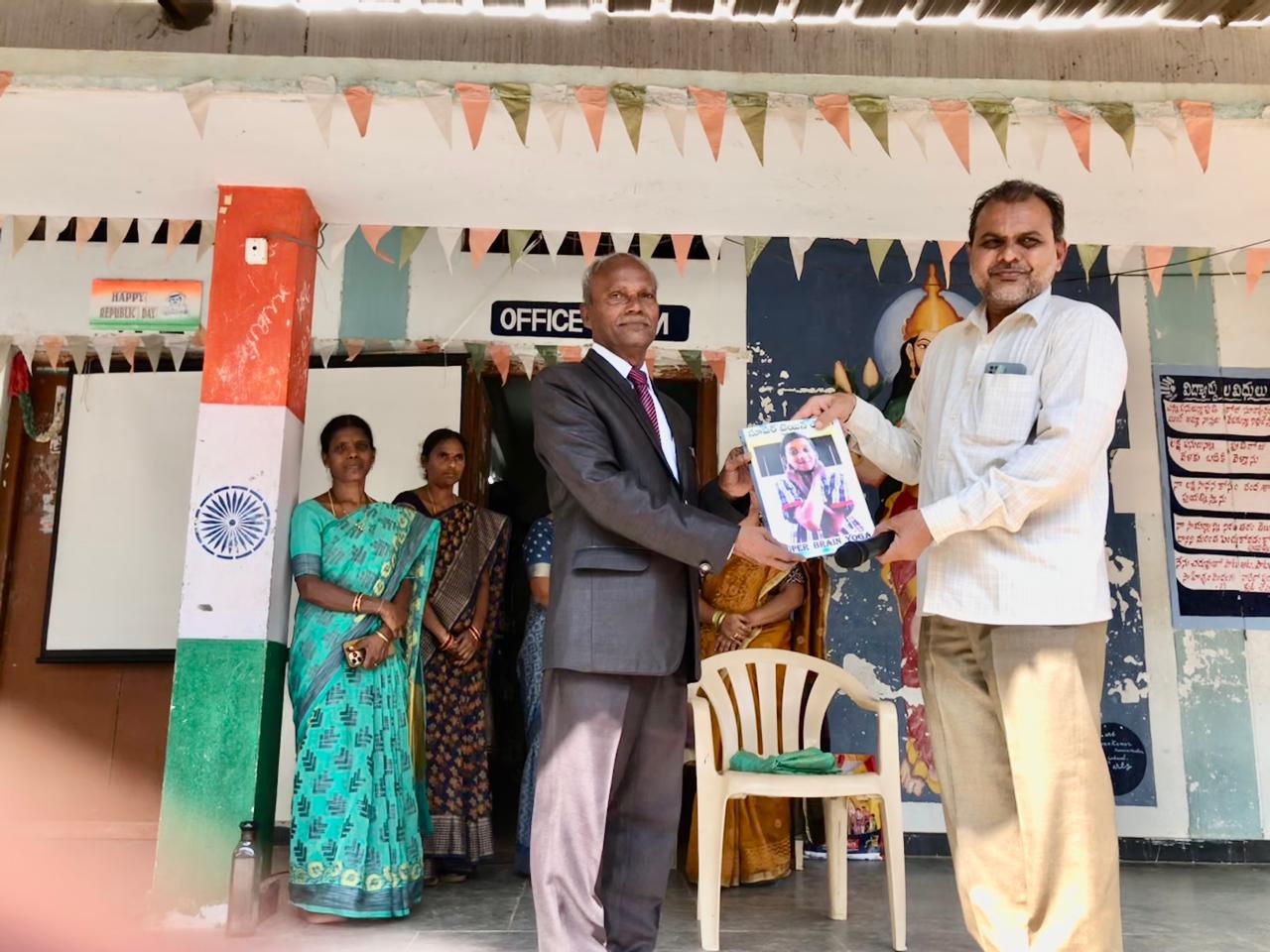 Presented copy of article published in SCERT Compendium to Head Master-Workshop on Super Brain Yoga at Govt. High School, Gadwal, Jogulamba-Gawal Dist.