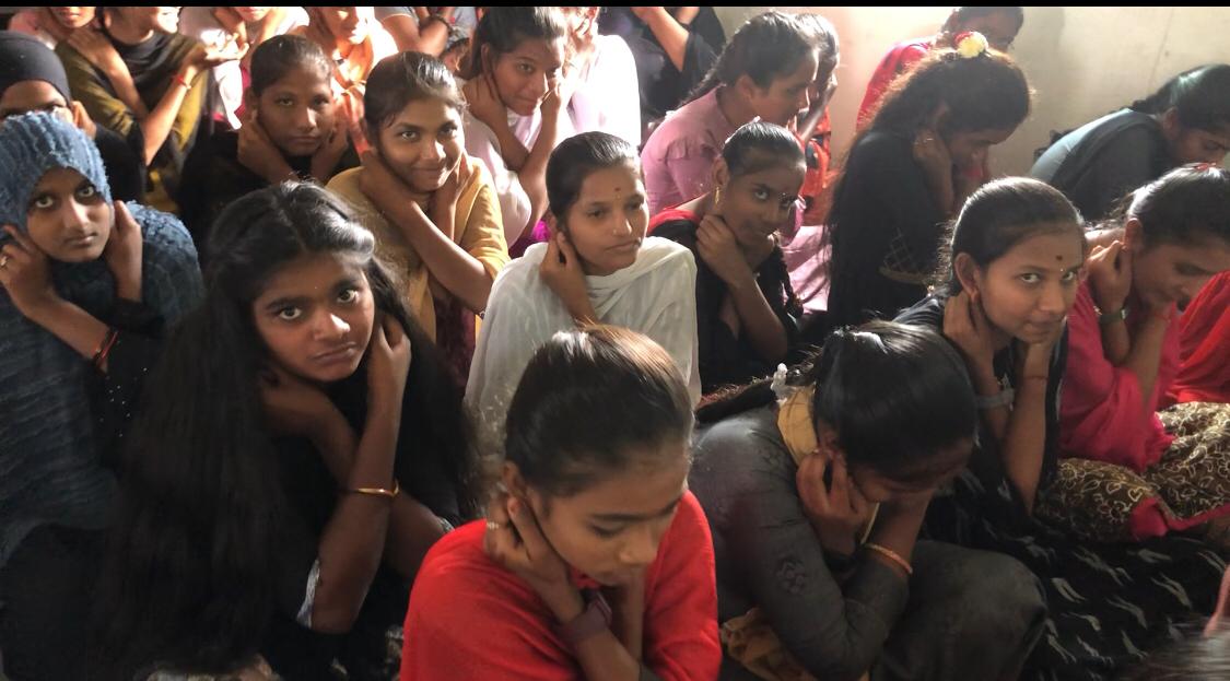 Positioning of fingers on earlobes - Workshop on Super Brain Yoga at Govt. Jr. College, Alampur, Jogulamba-Gadwal Dist.