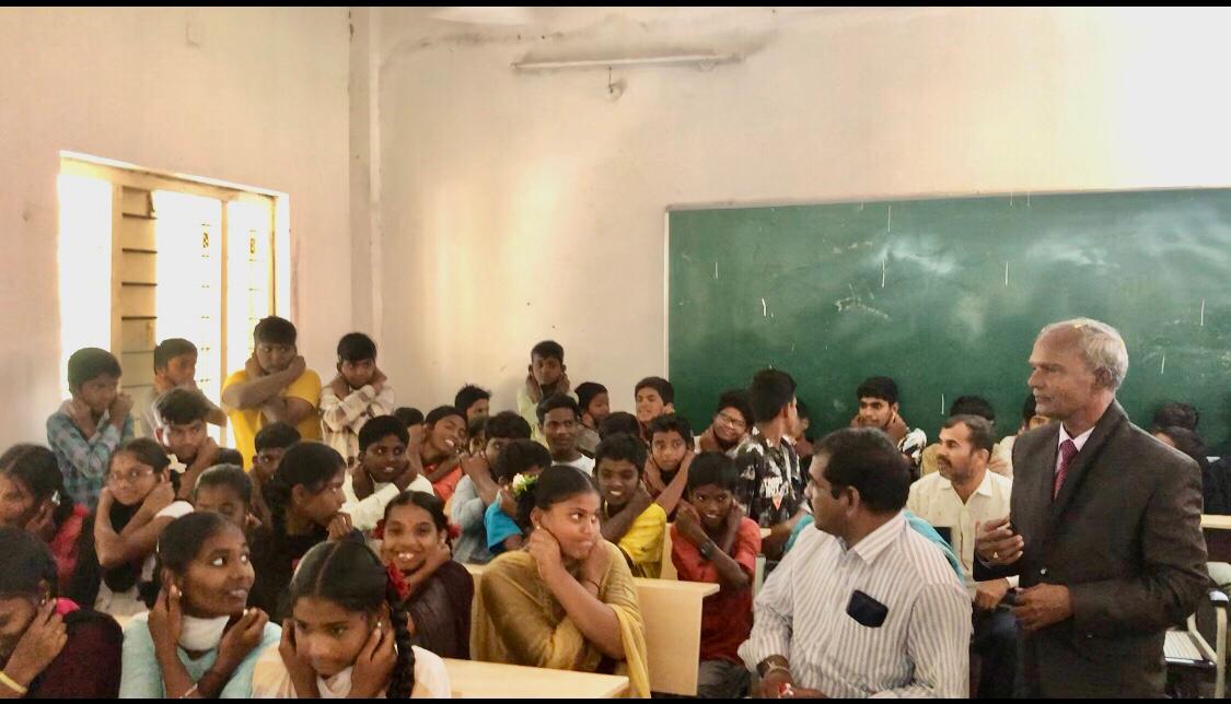 Positioning of fingers on earlobes-Workshop on Super Brain Yoga at Govt. Junior College, Alladurg, Medak Dist.