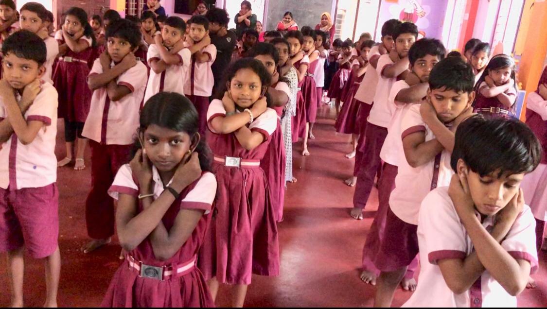 Students performing Super Brain Yoga at Govt. L. P. School, Velleri, Ponnani, Malappuram Dist., Kerala state.