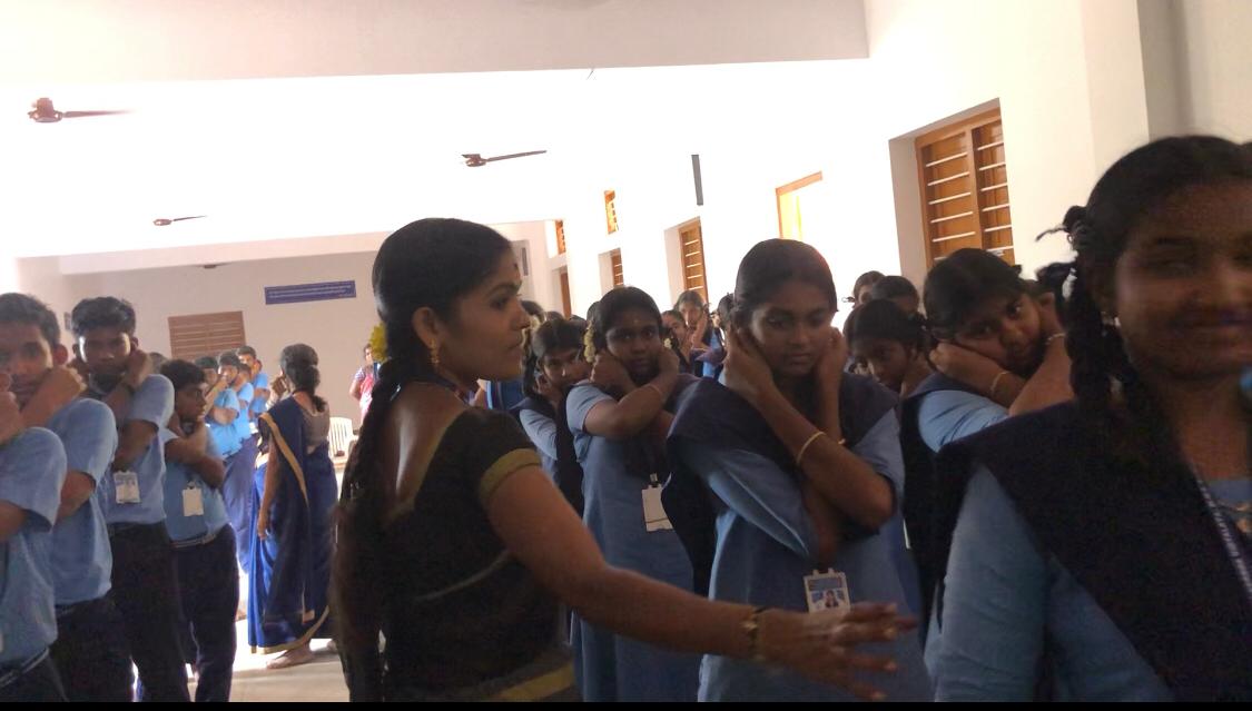 Students performing Super Brain Yoga at Vivekananda Kendra Matric Higher Secondary School, Kanyakumari, Tamil Nadu state.