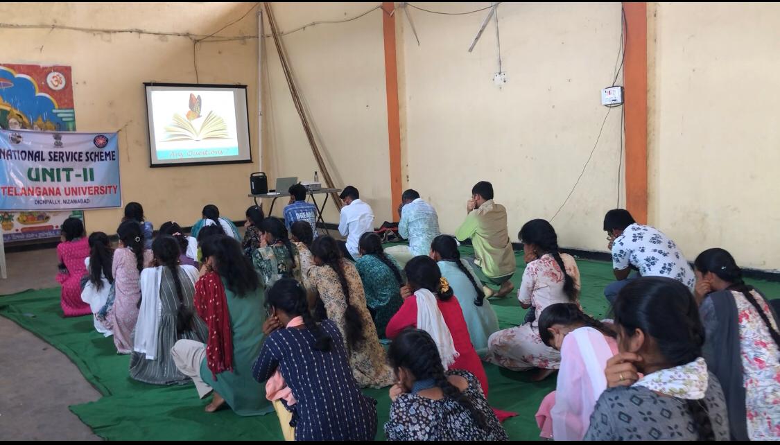 Volunteers performing Super Brain Yoga-Workshop on Super Brain Yoga at NSS, Unit-II, Telangana University at Dichpally Village.