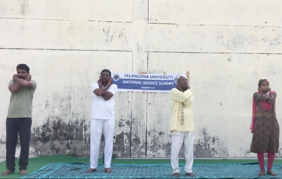 Preparatory steps for performing Super Brain Yoga at Telangana University organized by NSS Cell on the occasion of 12th International Day of Yoga.