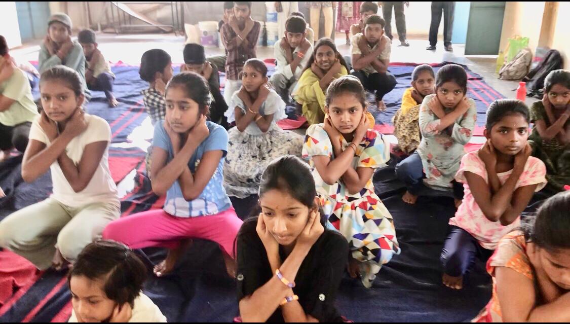 Students performing Super Brain Yoga at Summer Camp, PM Sri Govt. High School (JC), Rakasipet, BODHAN, sponsored by Patanhali Sukshma Dhyana Yoga Kendra, Bodhan and Patajnali Yoga Samithi, Bodhan.