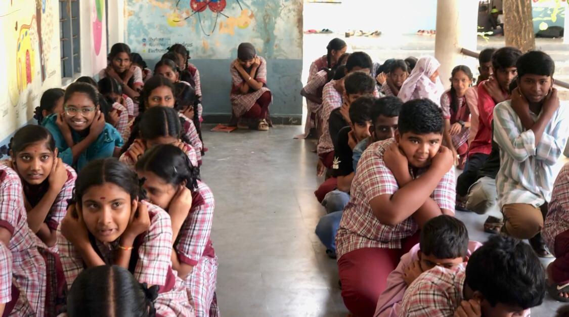 Students performing Super Brain Yoga - Workshop on Super Brain Yoga at Zilla Parishad High School, KESAEA, Medchal - Malkajgiri Dist.