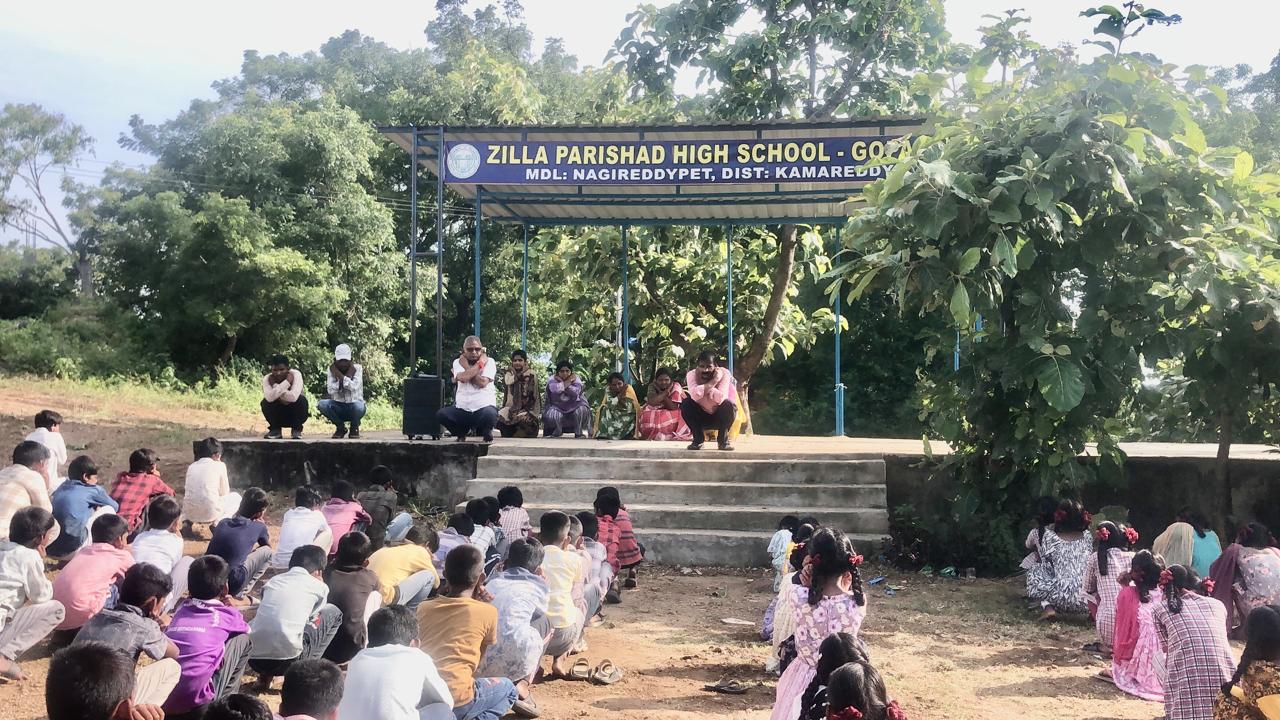Students performing Super Brain Yoga at Zilla Parishad High School, Gopalpet, Nagireddy Pet Mandal sponsored by International  Lions Club of Nizamabad-Netha.