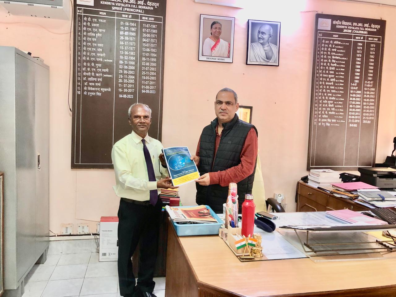 Presenting copy of article published on Super Brain Yoga to Principal, Kendriya Vidyalaya, FRI, Dehradun, Uttarakhand state.